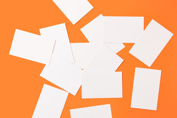 White professional business card mockup on orange background