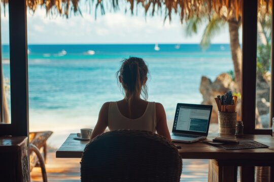 Freelancer working remotely from tropical paradise with ocean view