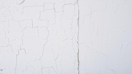 Rough and rugged white wall texture with cracks and peeling paint, weathered, worn