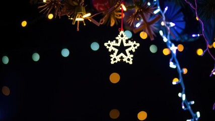 Fototapeta premium Cluster of string wired bulbs glowing against a white backdrop, decoration, electricity, illumination