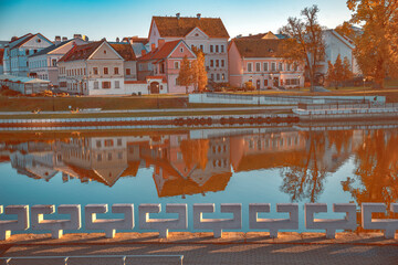 business and shopping center in Minsk at sunset by the river.