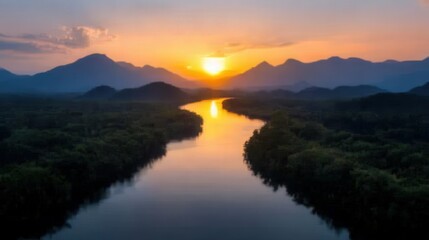 Obraz premium breathtaking sunset over a serene river surrounded by mountains