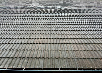 Fototapeta premium Roof tile backround texture, Grey color tiles construction closeup view