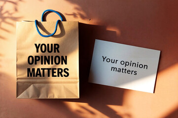 A brown paper bag with the label says sword text phrase "YOUR OPINION MATTERS"