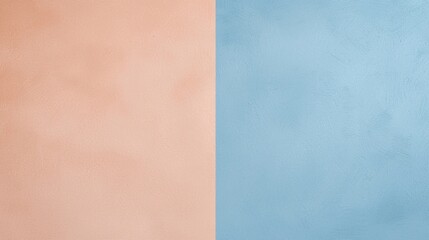 Fototapeta premium Soft peach and blue pastel colors divide a textured wall, creating a modern, elegant background. Inspiring creativity and peace, perfect for websites and social media