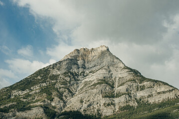 Closeup of snowcapped Haddo Peak mountain top as viewed from Morant's Curve at Lake Louise in Banff National Park, Alberta, Canada.