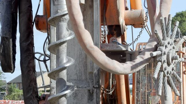 Piling rig auger drilling ground for concrete piles