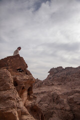 Woman on the top of mountain