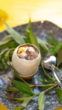 Vietnam street food. A bowl of duck eggs. Balut (boiled duck developing embryo) - Unique dishes in East Asian countries