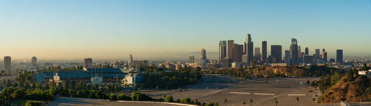 Lost Angeles, USA - October 29th 2024: Panorama of Dodger stadium and Los angeles downtown at sunrise