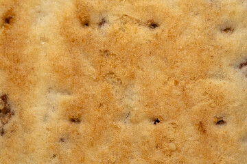 Cookie surface with white sugar baking sugar topping, close up of bread