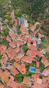 Aerial view of Eus, the medieval hilltop town in Pyrenees mountains, France. 