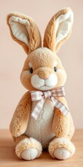 Obraz premium Soft plush hare with a charming bow around its neck, perfect for gifting or decor, fluffy, toy, hare