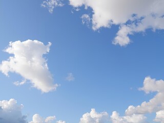 Obraz premium White fluffy cloud on a clear blue sky background, daytime, scenic, tranquil