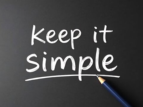 Keep it Simple: Handwritten Message on Black Chalkboard. AI Generated