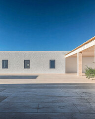 Modern architectural design featuring minimalist structures in a sunny outdoor setting