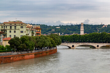 Naklejka premium the famous Ponte della Vittoria bridge over the river Etsch in Verona with a beautiful city view