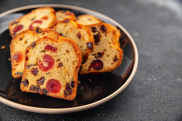 Fruit cake dessert sweet dried fruit traditional pastry, nuts meal food snack on the table copy space food background rustic top view