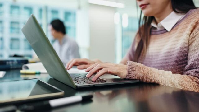 Student, laptop and hands with education notes at university with woman, study and thesis writing. College, class and knowledge with notebook, screen and website research for phd of graduate and app