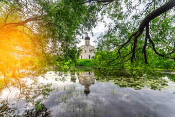 Church of Intercession upon Nerl River 12th century. (Bogolyubovo, Vladimir region, Golden Ring of Russia) A warm summer evening. historical and cultural heritage of Russia.