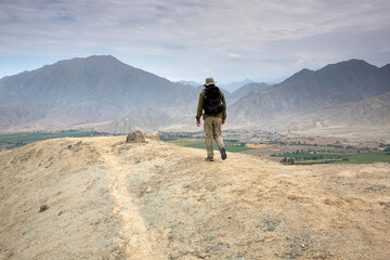 Fototapeta premium Exploring the cradle of civilization in the Americas.Caral, one of the world's oldest cities, dates back over 5,000 years. Its pyramids and complex structures remind us of the ingenuity and resilience