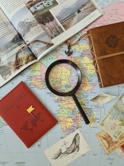 old map and magnifying glass,  travel flatlay