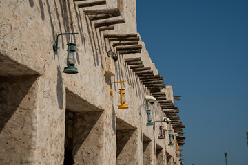 Souq Waqif in Doha, Qatar, is a vibrant and historic market known for its traditional Qatari architecture and bustling atmosphere.