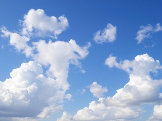 Fototapeta premium A stunning blue sky with cumulus clouds in various shapes and sizes floating gently, blue sky, day