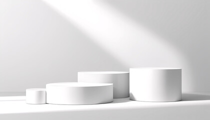 A white pedestal with three different sized cylinders