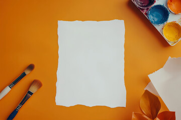 A Blank Canvas Awaits Creativity on a Vibrant Orange Background With Brushes and Paint, Inviting...