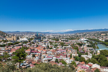 Fototapeta premium View on Tbilisi city from Sololaki hill on summer day. Georgia