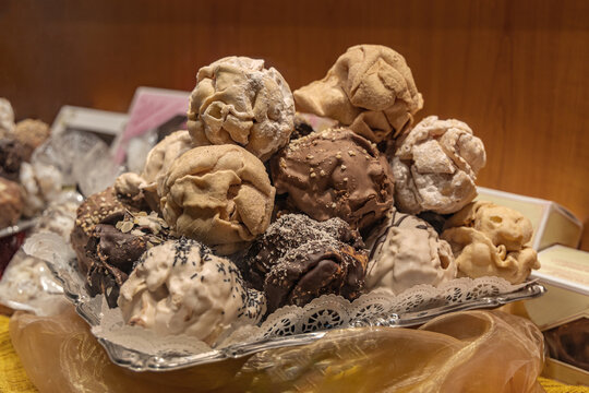 Local backery spacialty - Snow Ball sweets in a food tray with different sorts in Rothenburg ob der Tauber, Germany