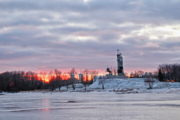 Veliky Novgorod, Russia. Panorama of Novgorod landmarks - Victory Monument commemorating Soviet victory over fascism and Trinity church in Veliky Novgorod, Russia. Winter architectural landscape
