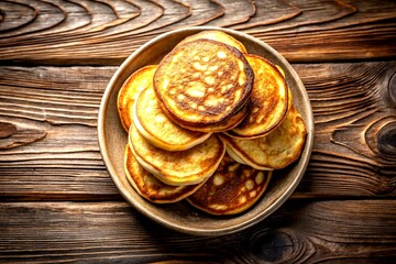Fototapeta premium Minimalist Flat Potato Pancakes on a Wooden Table - Top View Showcase of Deliciousness and Simplicity in Culinary Artistry