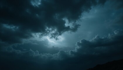 Obraz premium Stormy dark cloudy sky illuminated by flashes of lightning, creating a dramatic atmosphere