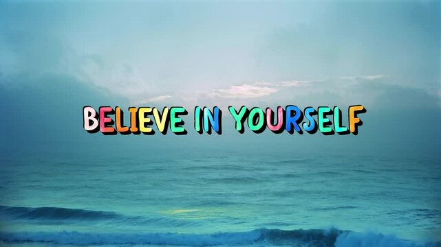 Positive motivational phrase &ldquo;Believe in yourself&rdquo; on a dreamy background written in cheerful letters