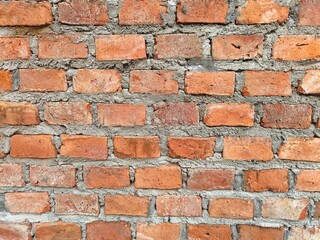 Old red brick wall, Vintage brick texture. Abstract blank background. Bricklaying, construction and masonry concept