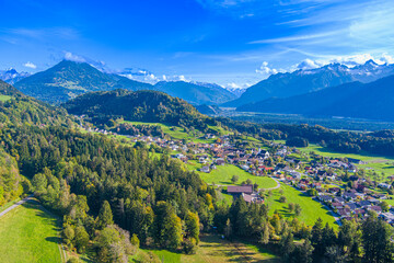 The Village of Schnifis in the Walgau Valley, looking to the Rh&auml;tikon Mountains with the Zimba, State of Vorarlberg, Austria. Drone Photography