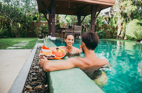 Happy couple spending time in a beautiful vacation house