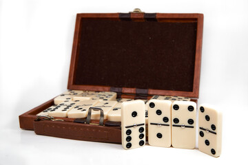 Isolated domino game vintage box set with velvet over white background