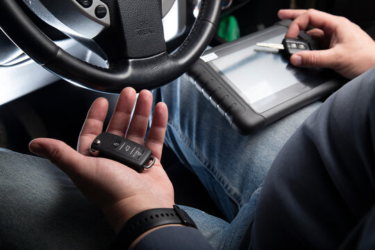 Production of car keys, Programming of car keys and repair.