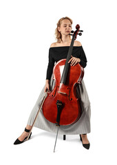 Beautiful young woman playing cello on white background © New Africa