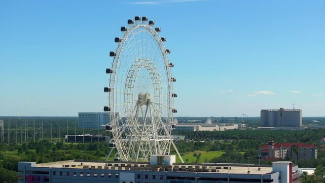 Amusement park in Orlando, Florida with Orlando Eye Ferris wheel at Icon Park. USA tourist attraction