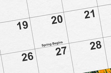 Spring begins on a 2025 calendar close up