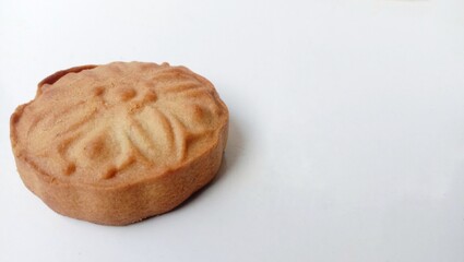 Landscape photo of a moon cake isolated on white background, sweet Chinese moon cake