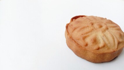 walnut and nutcracker,Landscape photo of a moon cake isolated on white background,traditional cake with sweet taste