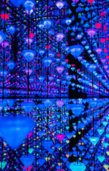 Bright glowing installation with blue and purple lights creating a vivid and immersive visual experience