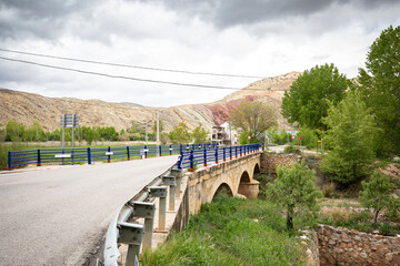 Fototapeta premium a bridge at the N-330 road entering Villel, province of Teruel, Aragon, Spain