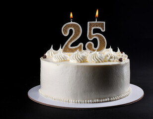 An elegant Birthday cake with 25th years birthday candles on dark background with copy space	