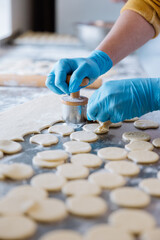 Preparing dough circles for traditional dumplings, showcasing handmade culinary craftsmanship
